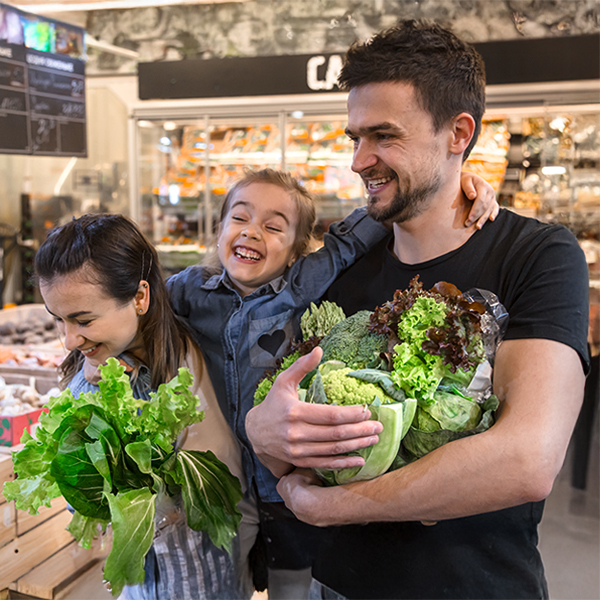 Worker holding produce